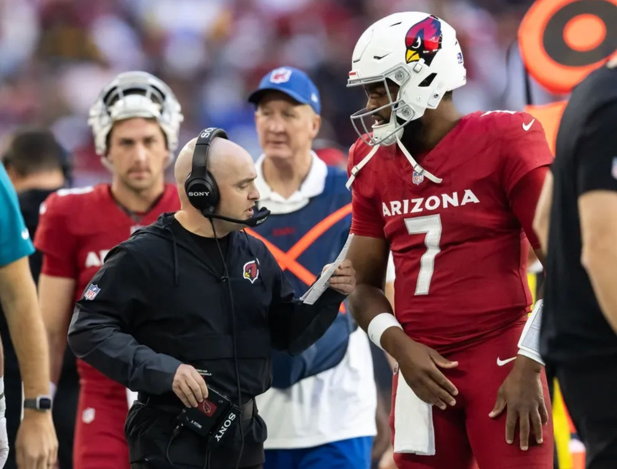 Dec 7, 2025; Glendale, Arizona, USA; Arizona Cardinals offensive coordinator Drew Petzing with quarterback Jacoby Brissett (7) against the Los Angeles Rams at State Farm Stadium. Mandatory Credit: Mark J. Rebilas-Imagn Images