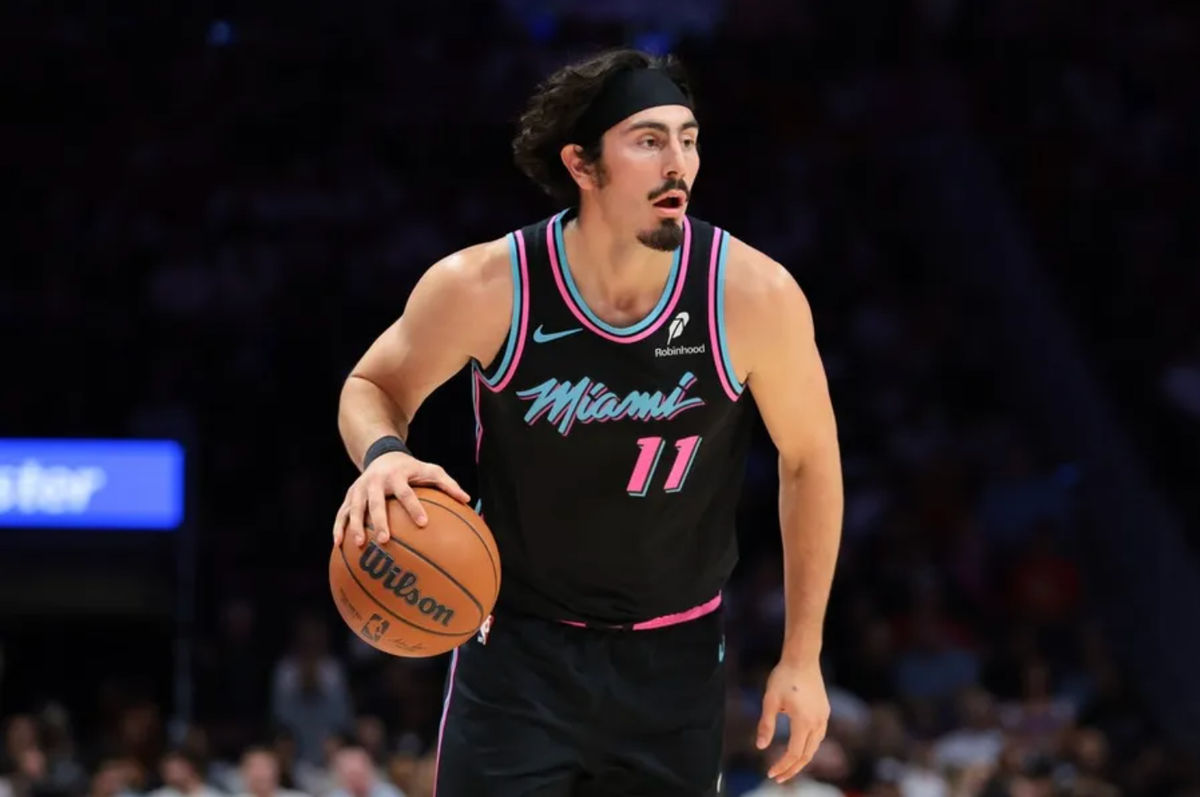 Nov 17, 2025; Miami, Florida, USA; Miami Heat forward Jaime Jaquez Jr. (11) dribbles the basketball against New York Knicks during the first quarter at Kaseya Center. Mandatory Credit: Sam Navarro-Imagn Images