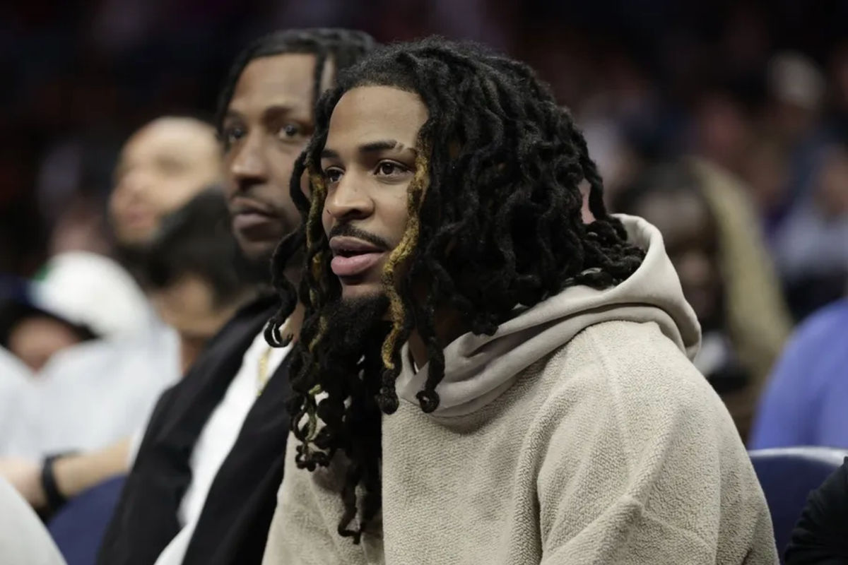 Mar 21, 2026; Charlotte, North Carolina, USA; Memphis Grizzlies guard Ja Morant watches from the bench during the second half against the Charlotte Hornets at Spectrum Center. Mandatory Credit: Brian Westerholt-Imagn Images