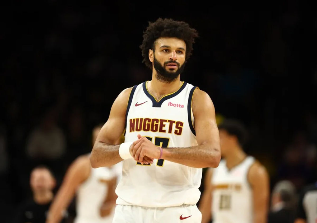 Nov 29, 2025; Phoenix, Arizona, USA; Denver Nuggets guard Jamal Murray (27) against the Phoenix Suns at the Mortgage Matchup Center. Mandatory Credit: Mark J. Rebilas-Imagn Images