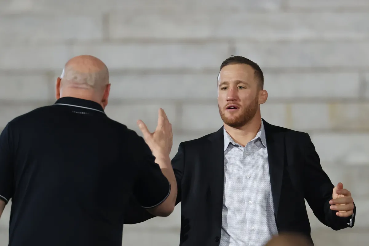 Jun 12, 2026; Washington, D.C., USA; Justin Gaethje greets Dana White during a press conference for the UFC Freedom 250 at Lincoln Memorial. Mandatory Credit: Amber Searls-Imagn Images